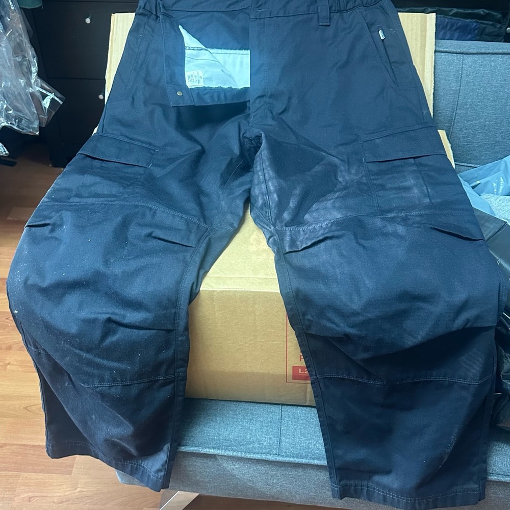 Navy Blue cargo pants I don’t believe I ever worn them, smh.  Great condition